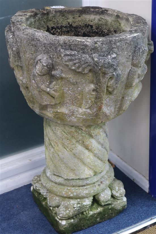 A reconstituted garden urn on pedestal, H.75cm